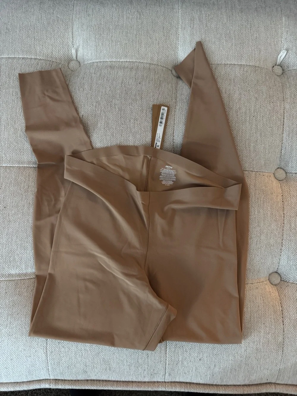 SKIMS Seamless Foundation Leggings Set in Nude, Black, and Brown - Picture 6 of 10